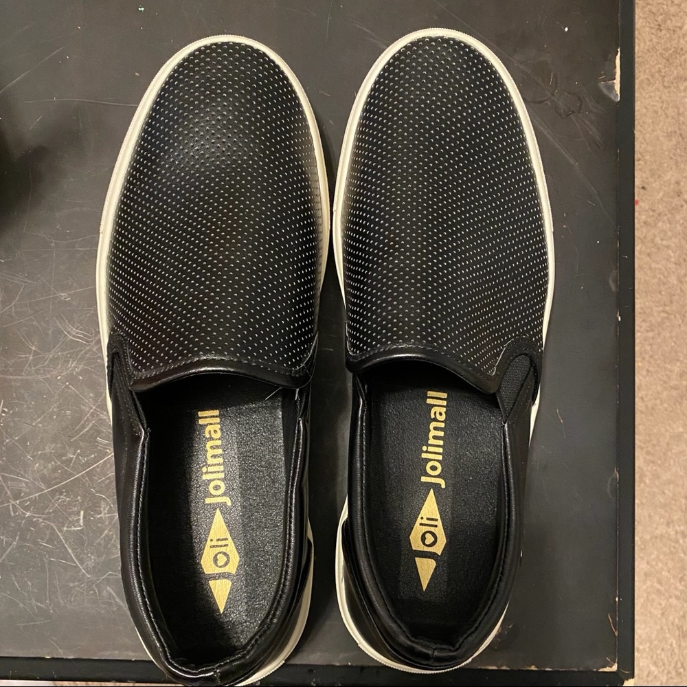 Black leather slip-ons